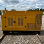 Side view of Olympian G100F1 Standby Natural Gas Generator providing cleaner natural gas standby power for industrial backup power