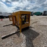 Outdoor shot of Olympian G100F1 Standby Natural Gas Generator providing cleaner natural gas standby power for mobile jobsite power