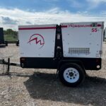 Outdoor shot of Magnum MMG55FH Trailer Mounted Diesel Generator - Tier 3 mounted on trailer for mobile jobsite power