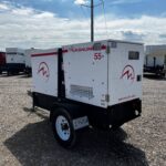 Close-up of Magnum MMG55FH Trailer Mounted Diesel Generator - Tier 3 mounted on trailer for commercial and industrial power needs