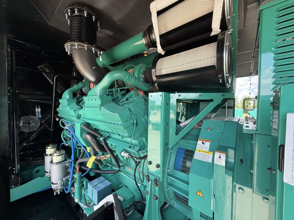 Outdoor shot of New Cummins DQKAN Diesel Standby Generator - Tier 2 with Tier 2 emissions compliance for mobile jobsite power