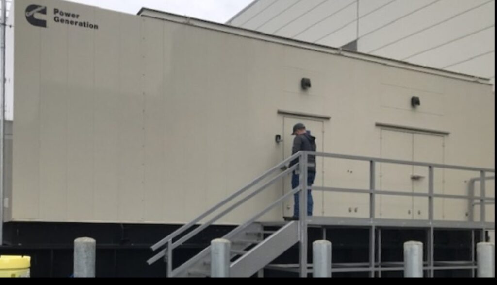Three-quarter view of Cummins DQKAF Standby Diesel Generator - Tier 2 with Tier 2 emissions compliance for mission-critical facilities