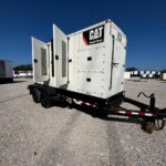 Outdoor shot of Caterpillar XQ350 Trailer Mounted Diesel Generator mounted on trailer for mobile jobsite power