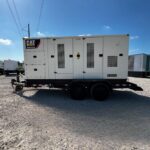 Detail shot of Caterpillar XQ350 Trailer Mounted Diesel Generator mounted on trailer for plant operations and utilities