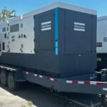 Close-up of Atlas Copco QAS700VD Trailer Mounted Diesel Generator mounted on trailer for commercial and industrial power needs