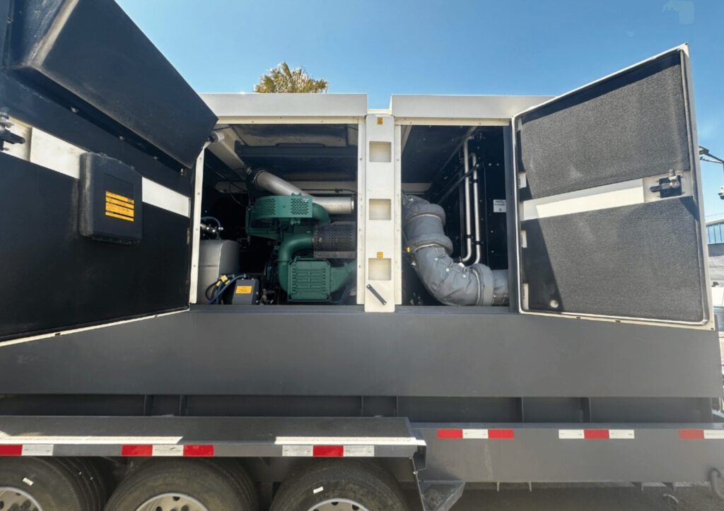 Studio shot of Atlas Copco QAS700VD Trailer Mounted Diesel Generator mounted on trailer for continuous reliable power