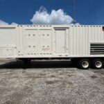 Outdoor shot of Caterpillar XQ1475G Natural Gas Power Module configured as an industrial power module for mobile jobsite power