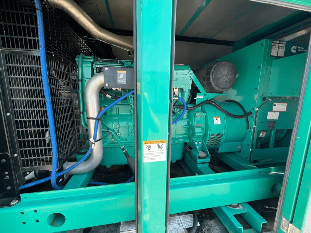 Side view of Cummins DFEK Standby Diesel Generator - Tier 2 with Tier 2 emissions compliance for industrial backup power