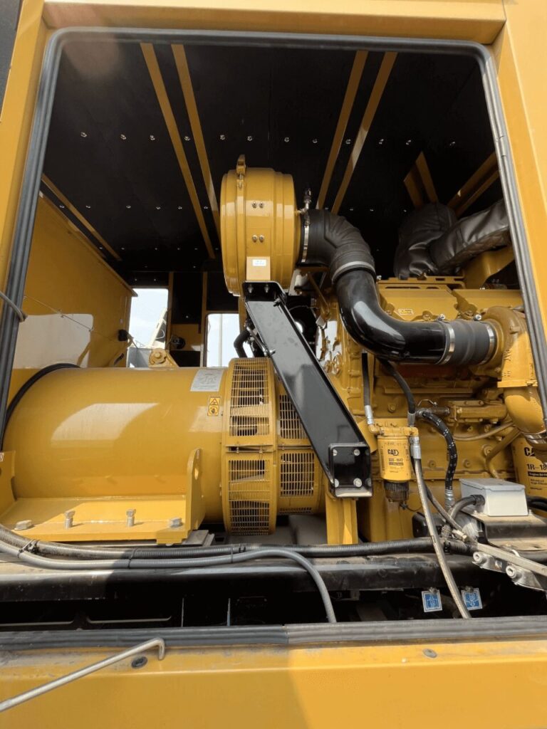 Skid-mounted view of Caterpillar C32 Standby Diesel Generator diesel unit for temporary power at construction sites