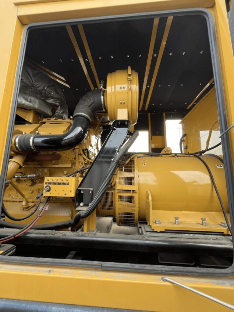 Side view of Caterpillar C32 Standby Diesel Generator diesel unit for industrial backup power