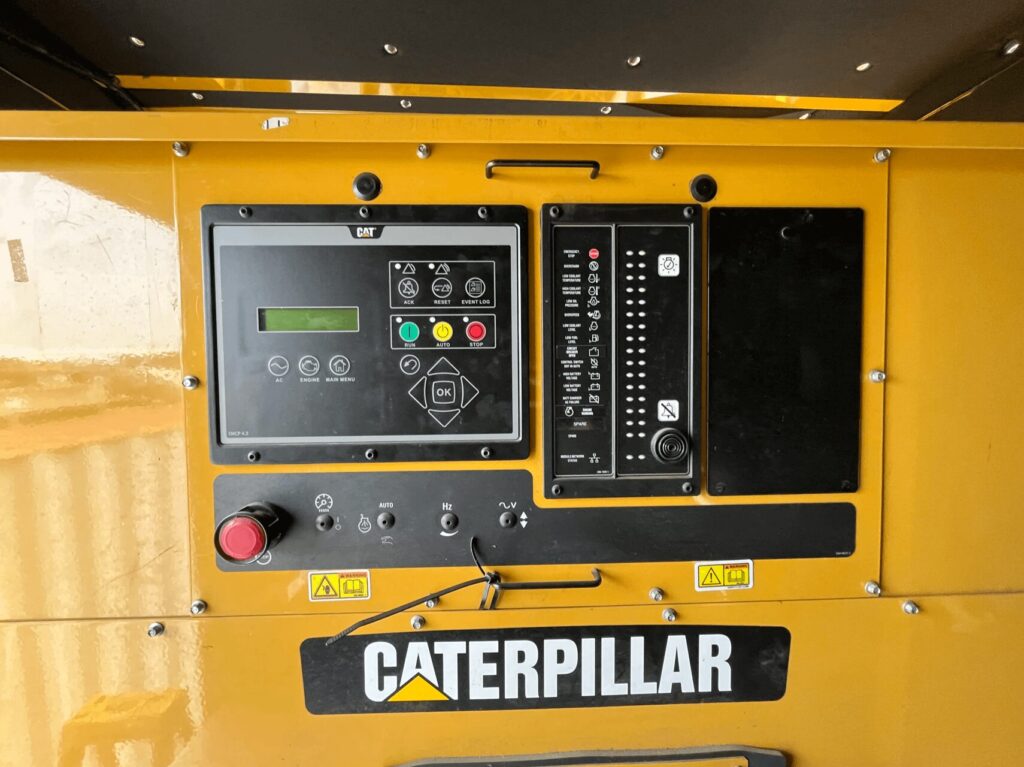 Skid-mounted view of Caterpillar C32 Standby Diesel Generator diesel unit for temporary power at construction sites