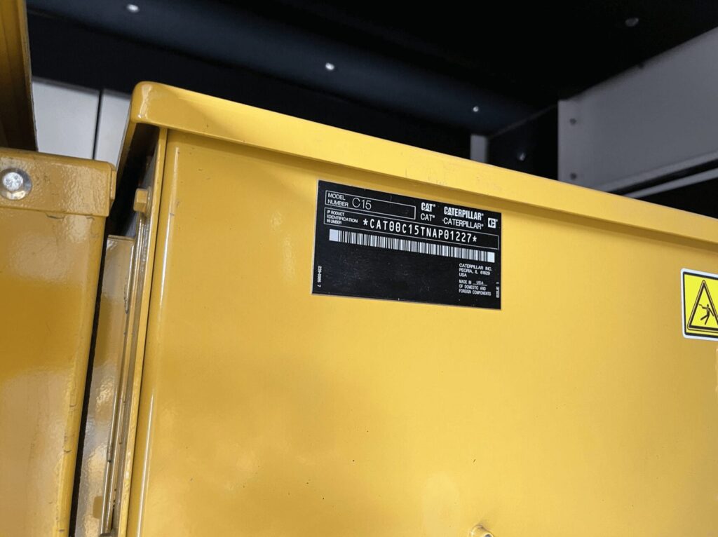 Detail shot of Caterpillar C15 Standby Diesel Generator diesel unit for plant operations and utilities