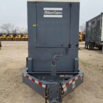 Three-quarter view of Atlas Copco QAS250 Trailer Mounted Diesel Generator mounted on trailer for mission-critical facilities