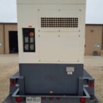 Side view of Atlas Copco QAS250 Trailer Mounted Diesel Generator mounted on trailer for industrial backup power