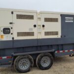 Studio shot of Atlas Copco QAS250 Trailer Mounted Diesel Generator mounted on trailer for continuous reliable power